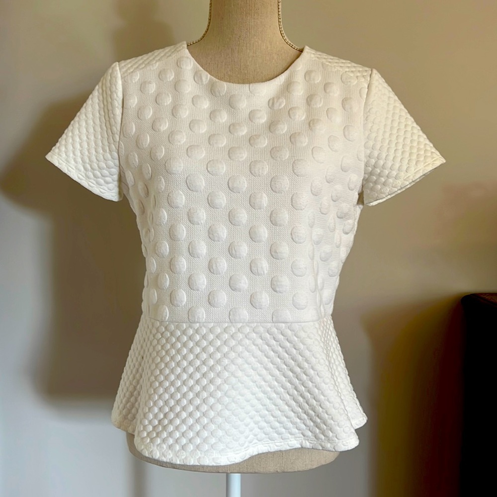 CeCe top white with polka dots.
